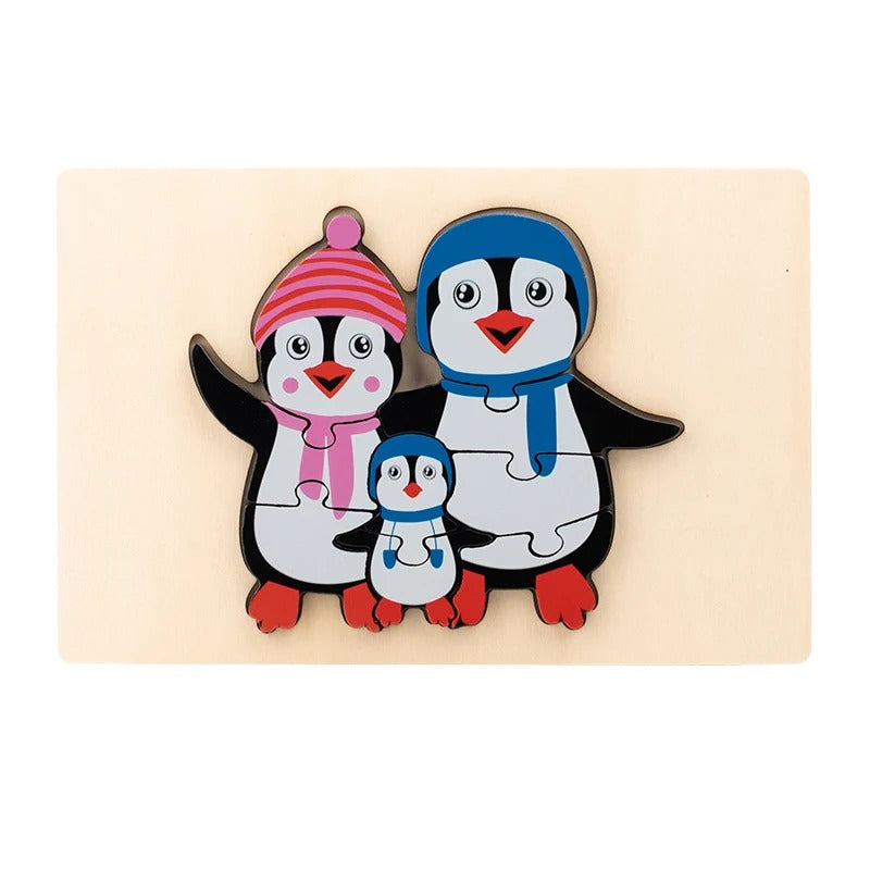 Penguin family puzzle wearing knitted hats and scarves