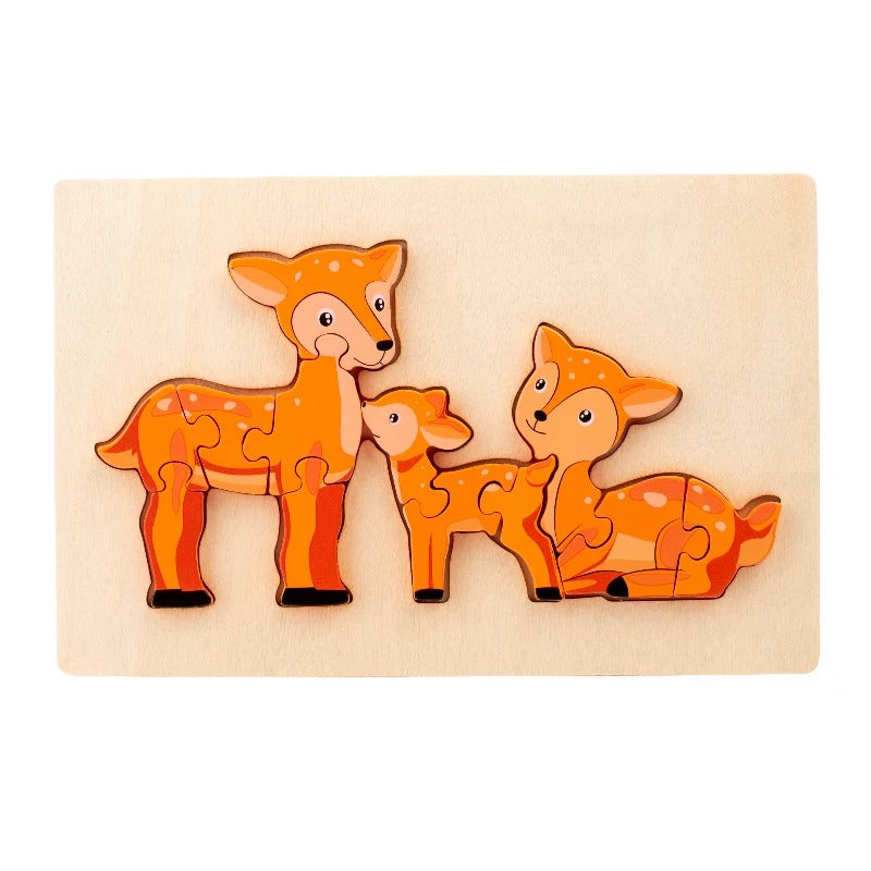 Wooden deer family puzzle with mother and fawn pieces on a light tray