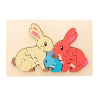 Rabbit family puzzle with pink and cream bunny pieces