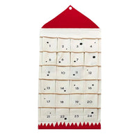 Fabric advent calendar with a red roof and 24 numbered pockets