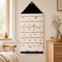 Advent Calendar Toddler – Fabric Wall Calendar 24 Pockets set out on a real table at home