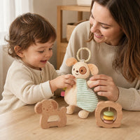 Child using the Baby Comfort Toy Set with Teether and Rattle