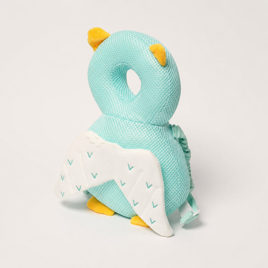 Mint green baby head protector pillow with bee wings, front view