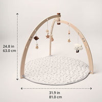 Baby play gym with its arch and star mat, shown with dimensions