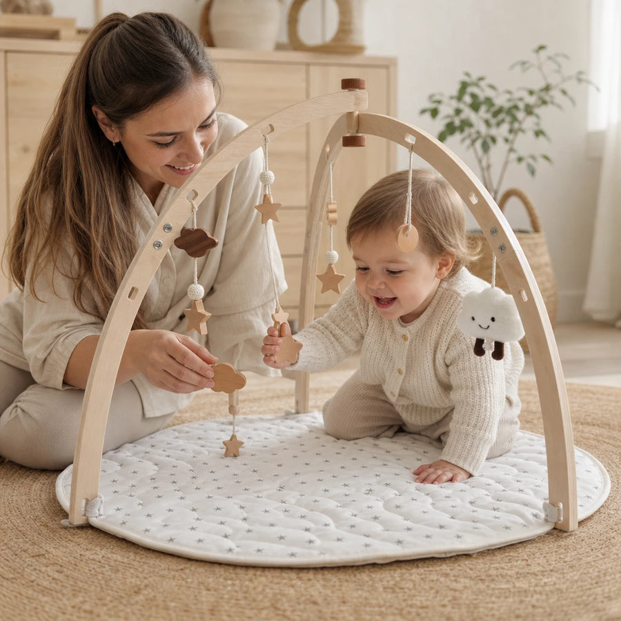 Child playing with the Baby Play Gym Wooden Arch & Mat