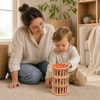 Child playing with the Baby Rain Stick Wooden Sensory Toy