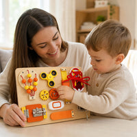 Child playing with the Busy Board for Toddlers with Sensory Activities