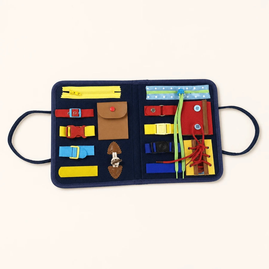 Busy Board Toddler Activity Board with Zippers shown complete on a plain background