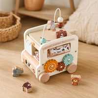 Car Busy Board 5-in-1 Animal Tourism Bus set out on a real table at home