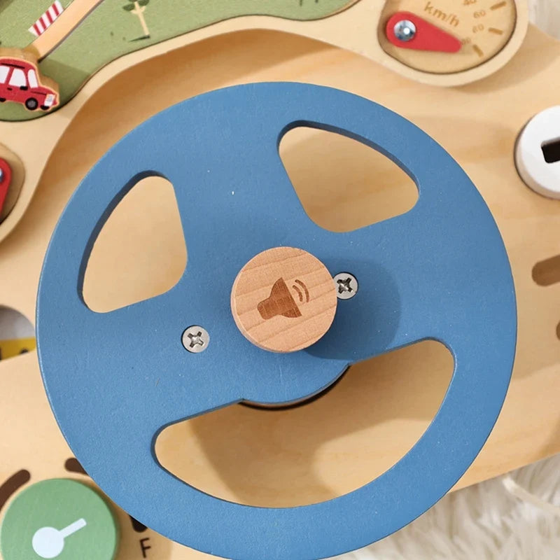 Blue wooden steering wheel mounted on the car activity board