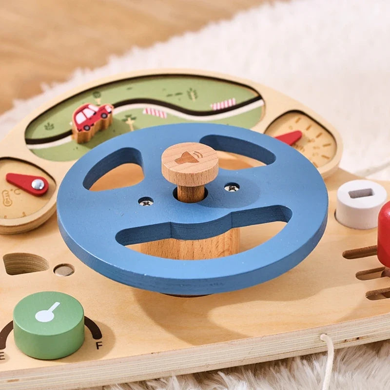 Wooden steering wheel and dashboard controls seen from above