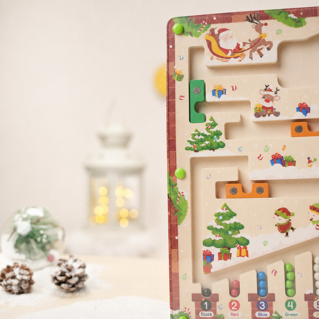 Christmas magnetic maze board seen in full with festive decorations