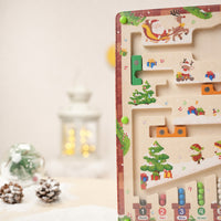 Christmas magnetic maze board seen in full with festive decorations