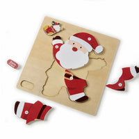 Child assembling the Santa Claus wooden puzzle