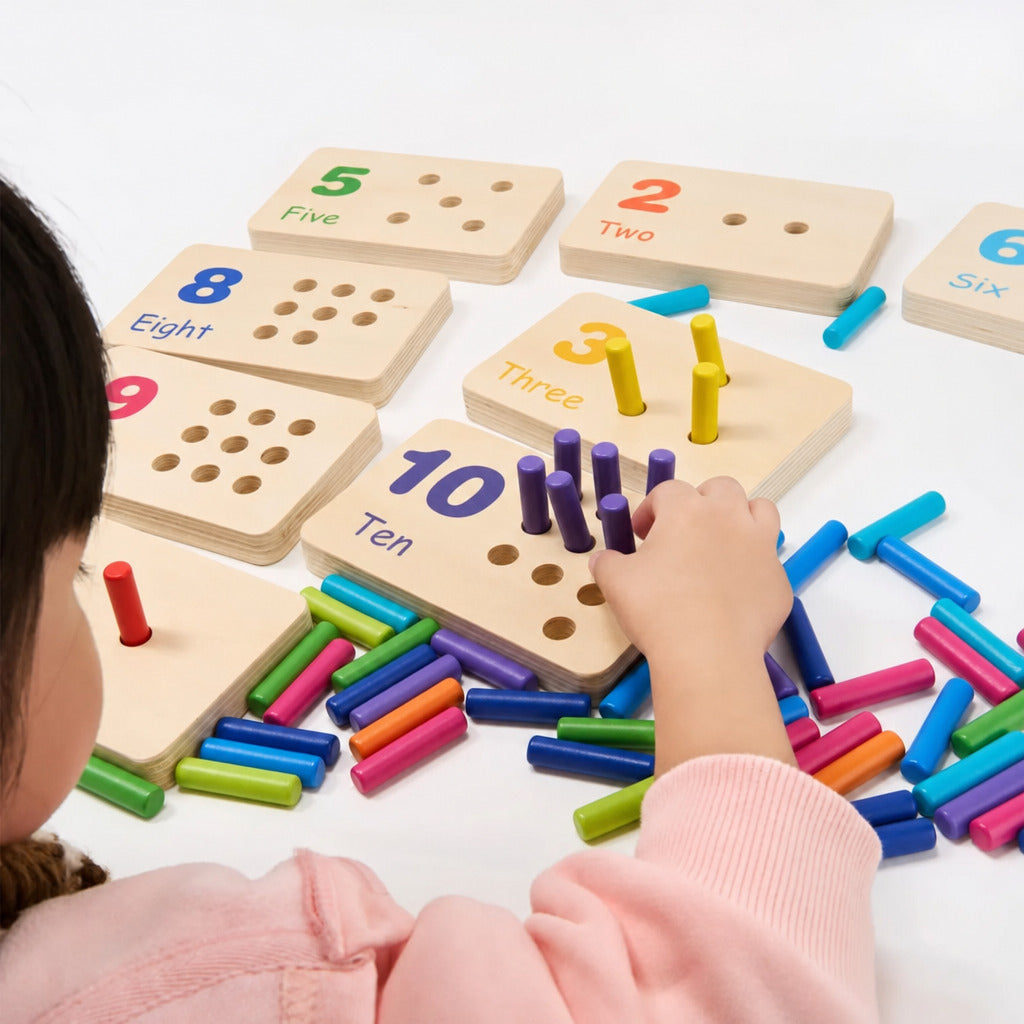 Child placing coloured pegs into the counting board tiles