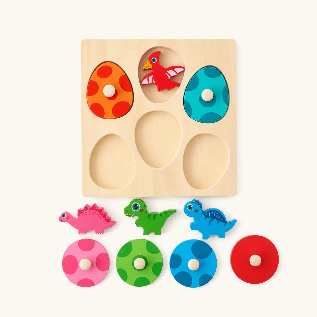 Dinosaur Egg Puzzle with Wooden Figures shown complete on a plain background
