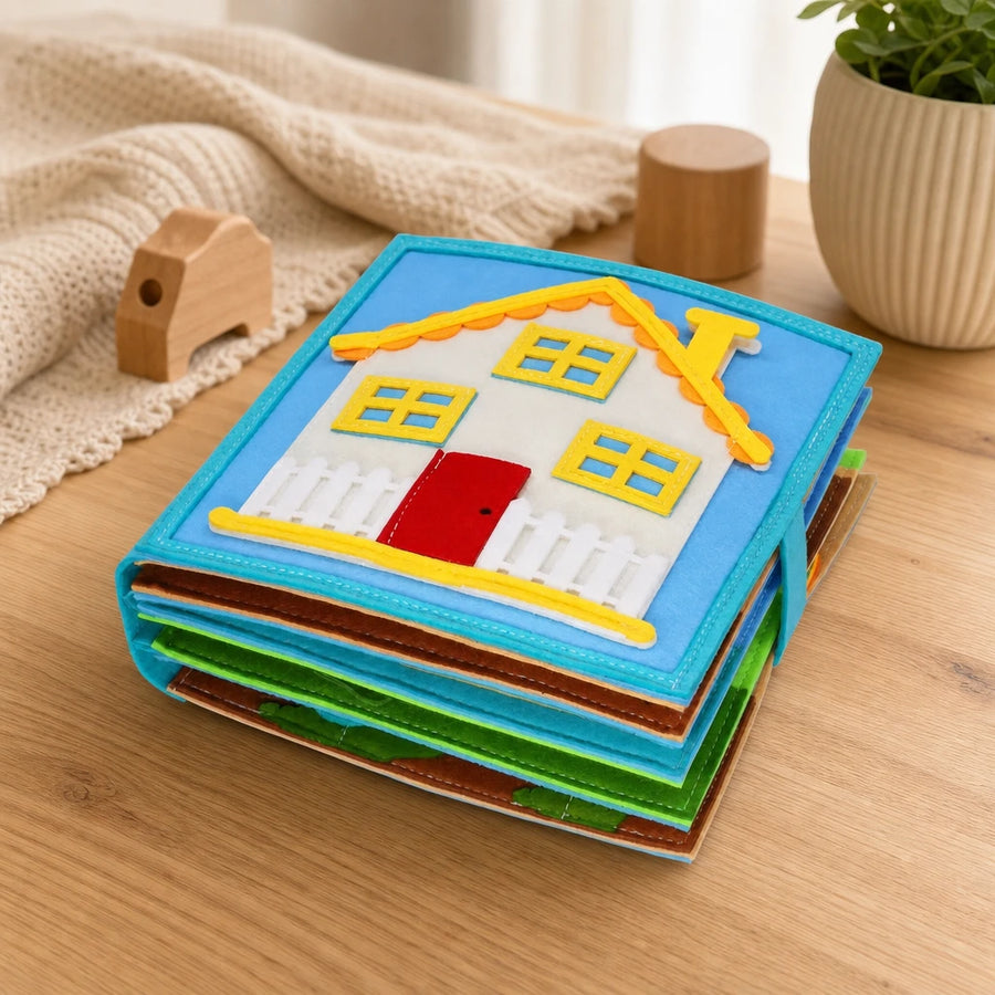 Felt Quiet Book House Activities set out on a real table at home
