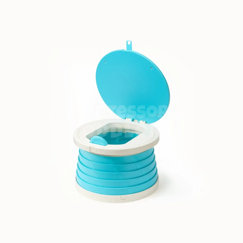 Blue foldable travel potty with the lid open