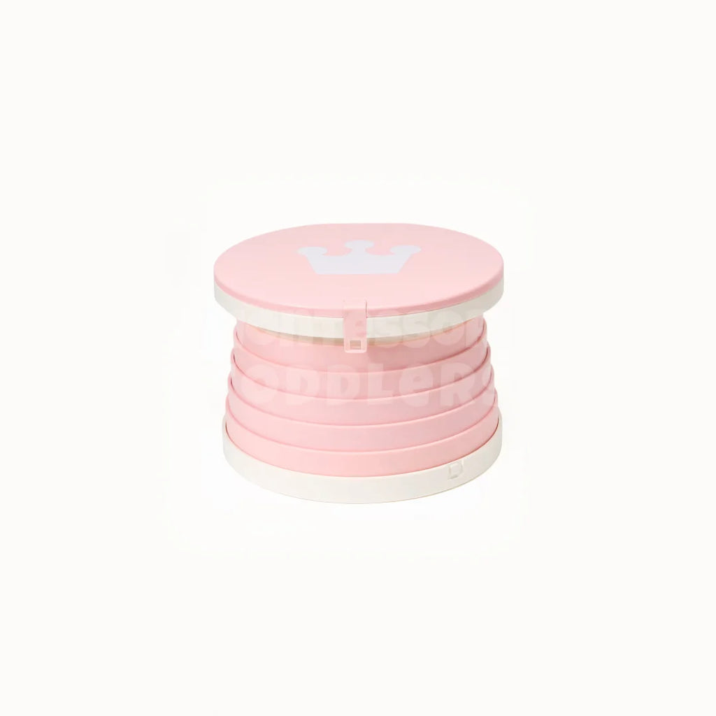 Pink travel potty folded flat for storage