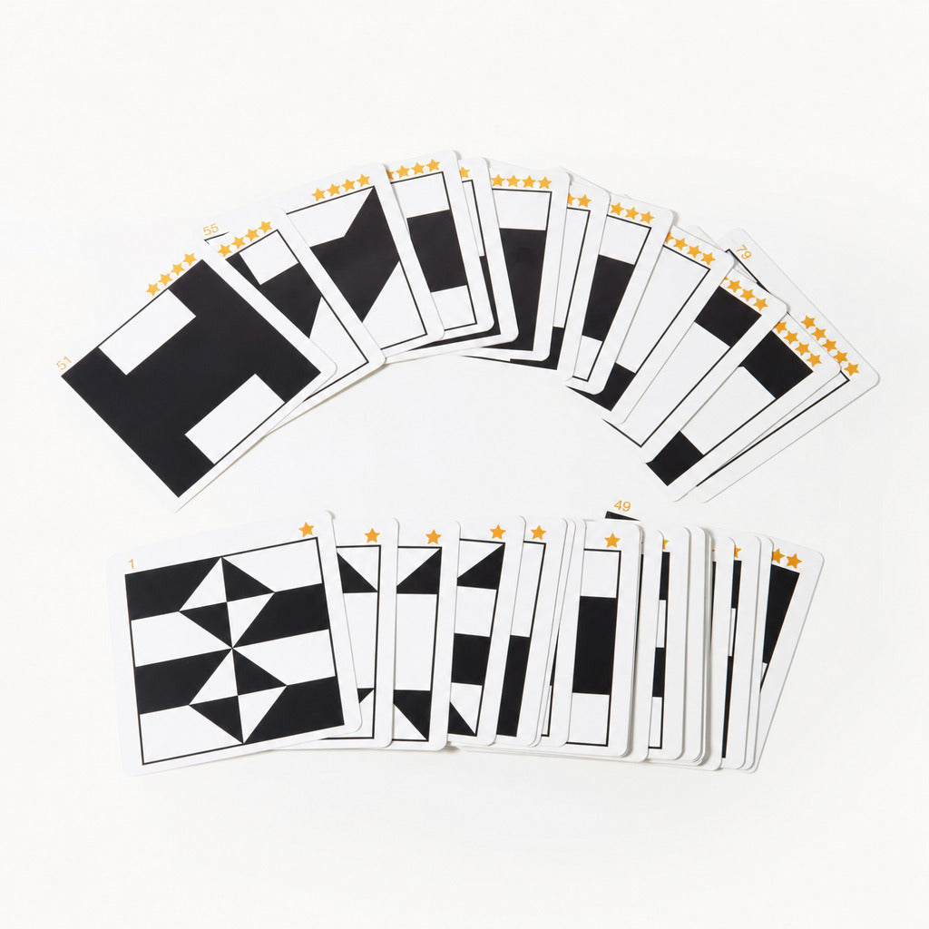 Set of black and white geometric pattern cards fanned out