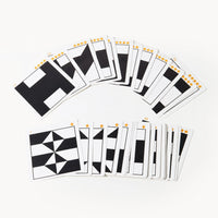 Set of black and white geometric pattern cards fanned out