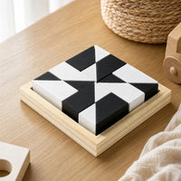 Geometric Shape Puzzle Montessori Wooden Blocks set out on a real table at home