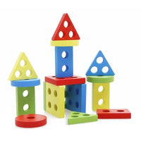 Coloured geometric blocks built into a small tower and castle