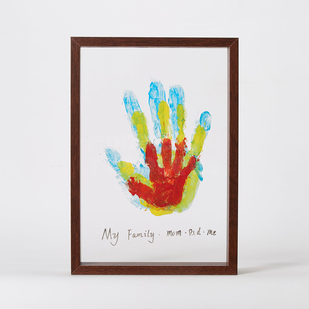 Dark wood handprint frame with a family handprint keepsake