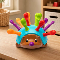 Hedgehog Peg Toy - Montessori Fine Motor set out on a real table at home