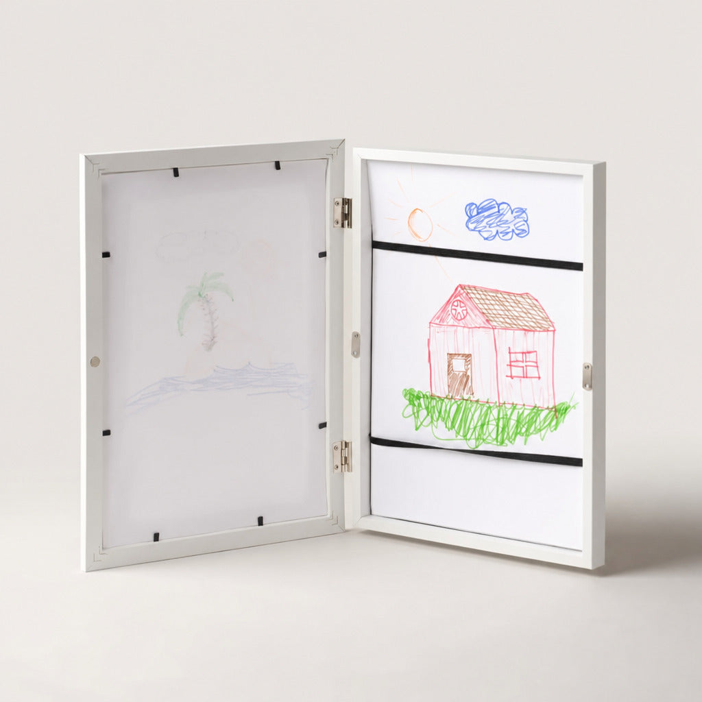 White art frame opened to reveal the internal drawing storage straps