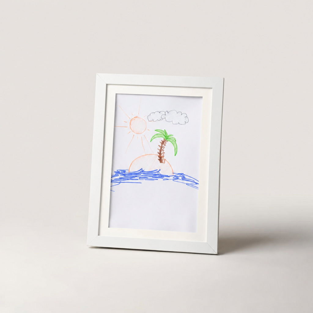 White kids art frame standing upright with a crayon drawing