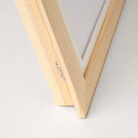 Detail of the opened frame hinge seen from above