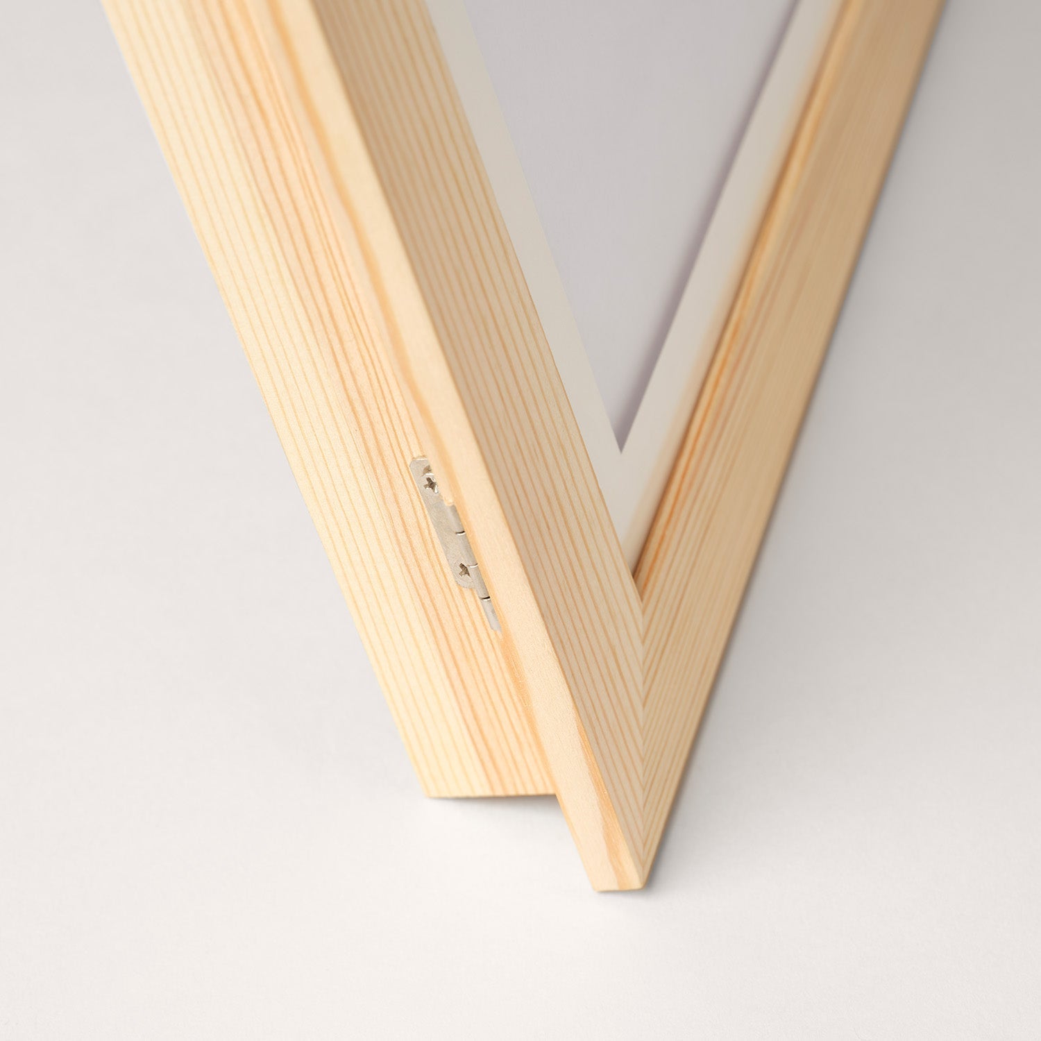 Detail of the opened frame hinge seen from above