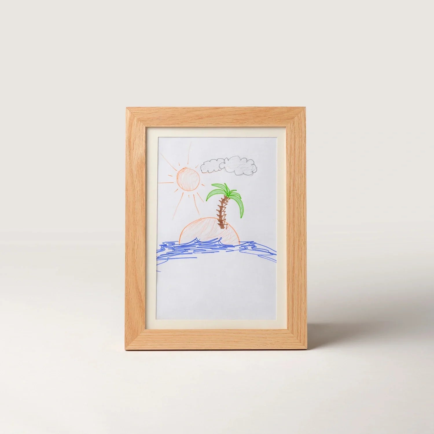 Oak kids art frame in portrait format with a child's drawing