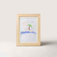 Pine kids art frame in portrait format with a child's drawing