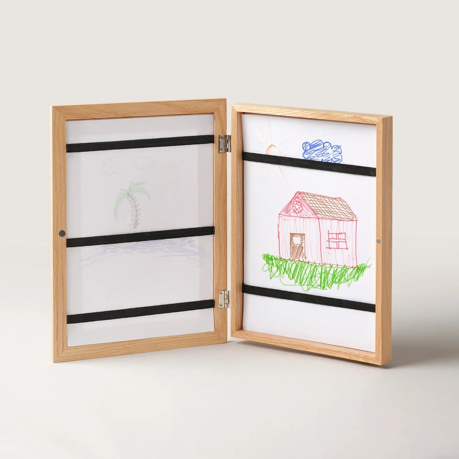 Oak art frame opened flat showing the drawing storage straps