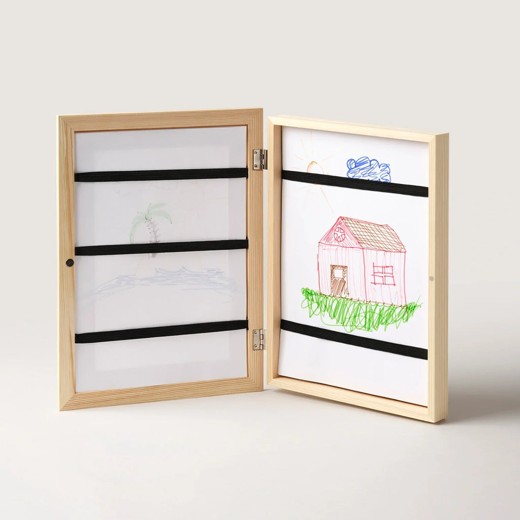 Pine art frame opened at an angle revealing internal storage