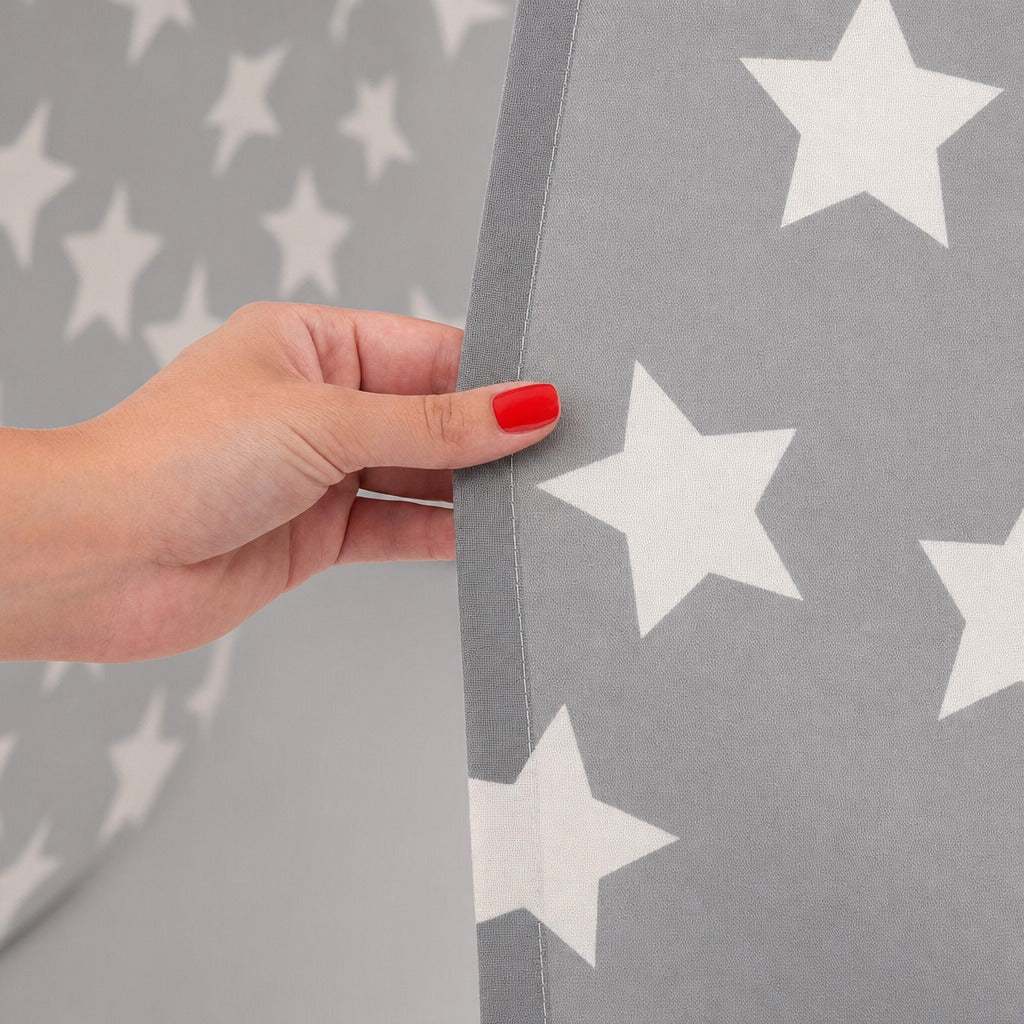 Detail of the grey star print canvas of the kids teepee tent
