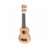 Wooden kids ukulele shown from the front with four nylon strings