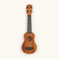 Kids Ukulele Montessori Musical Learning Instrument shown complete on a plain background