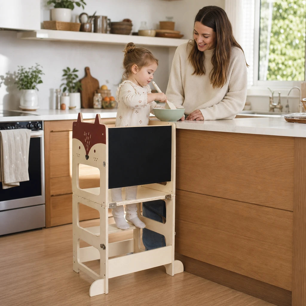Child playing with the Learning Tower 2-in-1 Table & Easel