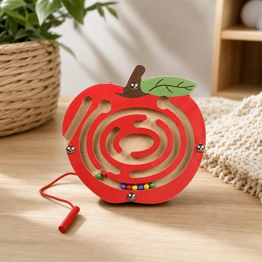 Magnetic Maze Toy Apple Shape Wooden set out on a real table at home