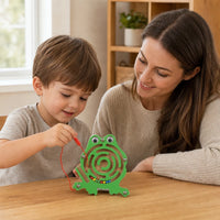 Child playing with the Magnetic Maze Toy - Frog Shape