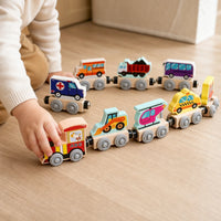 Close-up of a child's hands using the Magnetic Train Toy Wooden Vehicles Set