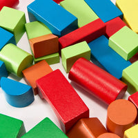 Close-up of the wooden building blocks in red, green and blue