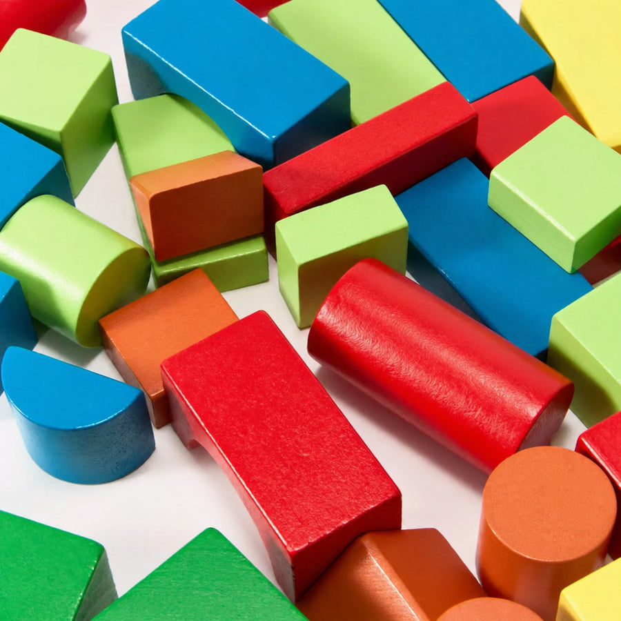 Close-up of the wooden building blocks in red, green and blue