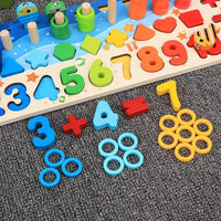 Close-up of the counting puzzle numerals and coloured ring pieces
