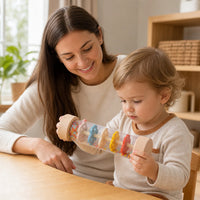 Child playing with the Montessori Music Toys - Rainbow Rainstick