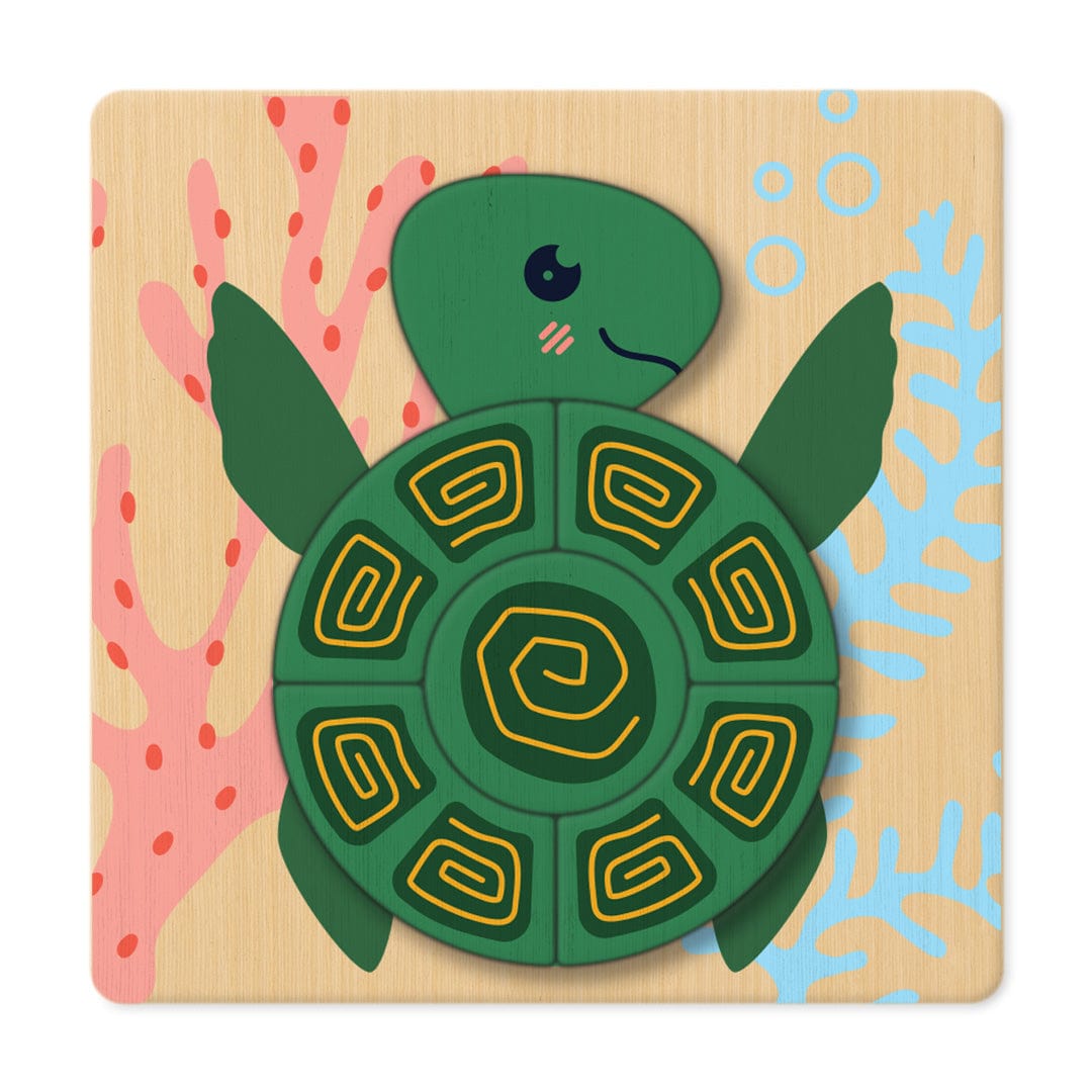 Green turtle layered wooden puzzle on a coral background