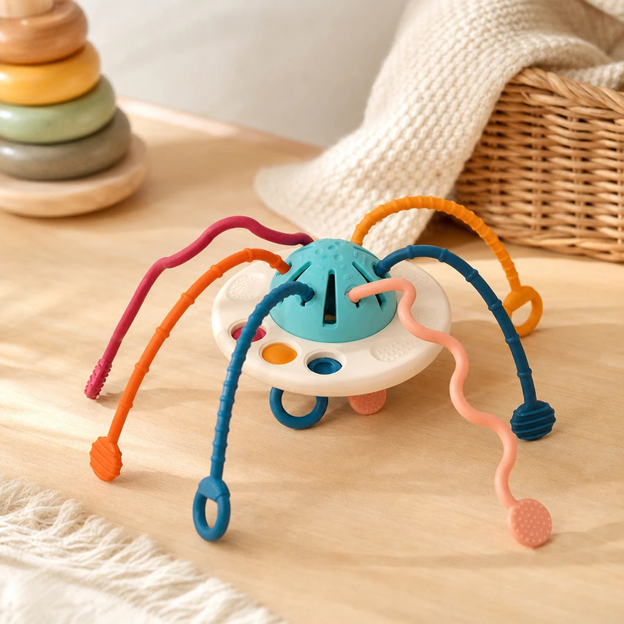Montessori Silicone Pulling Toy Multi-Textured set out on a real table at home
